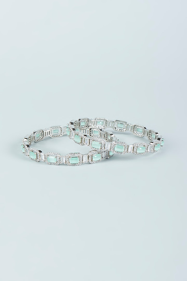 White Finish Aqua Synthetic Stone & Zircon Bangles (Set of 2) by Aster at Pernia's Pop Up Shop
